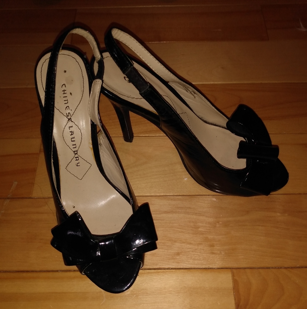 black high heels with bow on front
